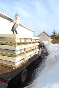 A hilarious old coworker getting ready to install package bees in the snow
